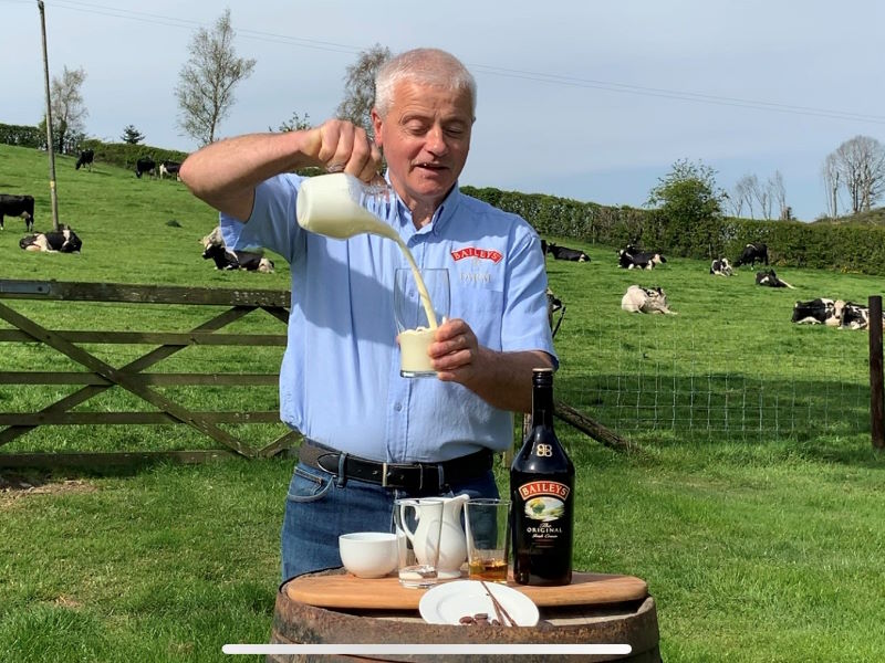 Joe pouring cream with Baileys ingredients